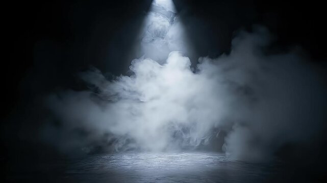 A dramatic scene unfolds with thick, ethereal white smoke swirling and flowing across a dark, reflective surface, brilliantly illuminated by a powerful single spotlight beaming down from above. The in