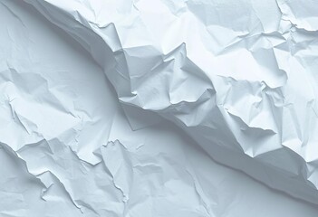 Fototapeta premium Close-up of a crumpled sheet of white paper, showing deep creases and texture, creased paper, close-up
