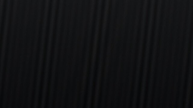 Waves ripple through gradients of gray and black