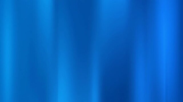 Smooth blue silk wave background with soft gradient lines and a bright satin fabric texture for an abstract wallpaper design