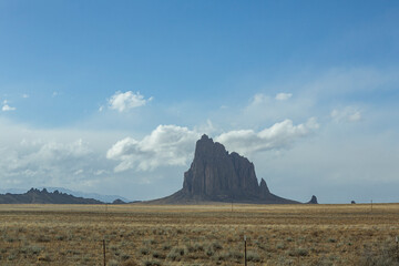 Ship rock formation jutting out from landscape © Cavan