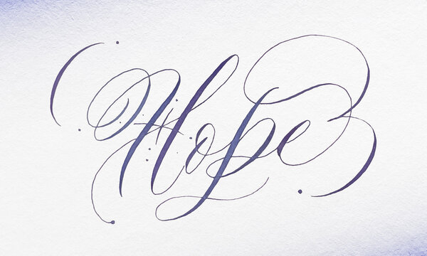 Inspirational word Hope, handwritten calligraphy with dip pen