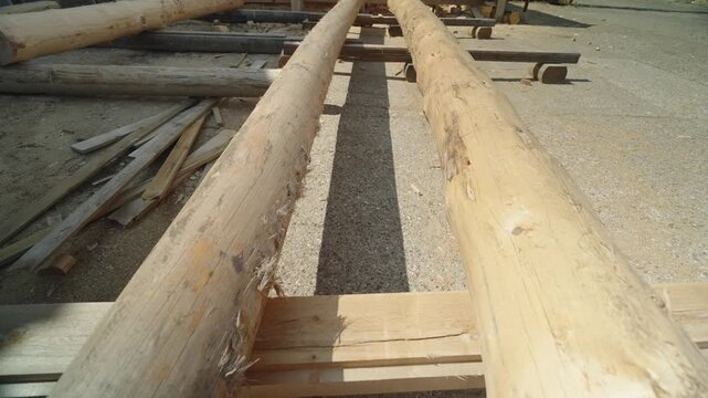 View of flat wooden logs after processing for construction