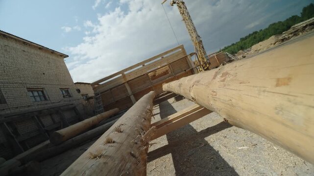 View of flat wooden logs after processing for construction