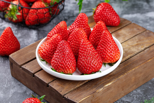 Fresh Red Strawberries on White Plate and Wooden Board - Healthy Natural Fruit