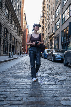 Beautiful woman exploring the streets at Dumbo in Brooklyn / New York
