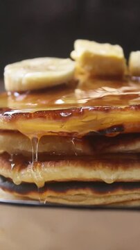 stack of pancakes with honey. Vertical video