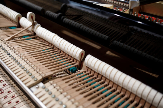 Grand piano action mechanism close up detail