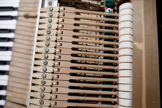 Grand piano action mechanism close up detail