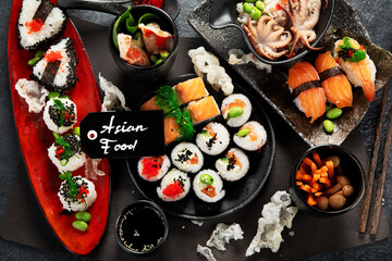 Various types of sushi including nigiri and rolls. Asian food concept. © bit24