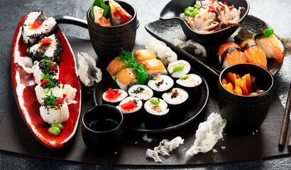Various types of sushi including nigiri and rolls. Asian food concept. © bit24