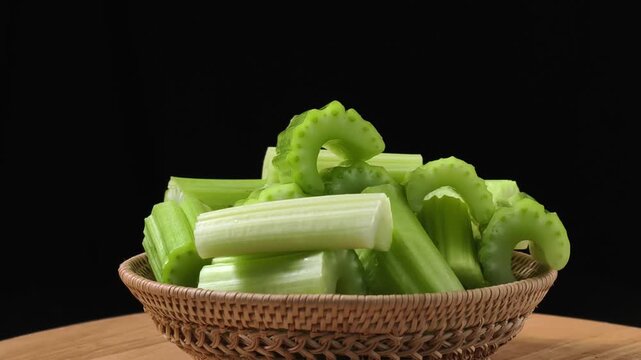 Chopped green celery in a small basket