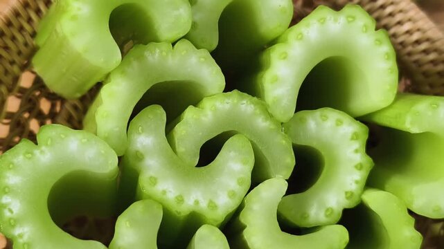 Chopped green celery in a small basket