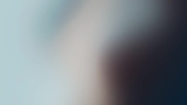 Abstract blue background with brushed metallic lines and a smooth silver gradient texture featuring a light motion blur design