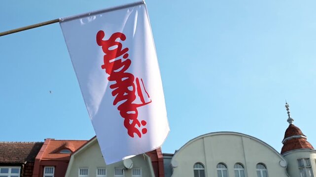  flag waving against blue sky. Polska. Independence. Niepodległość. Solidarność. Flaga.	