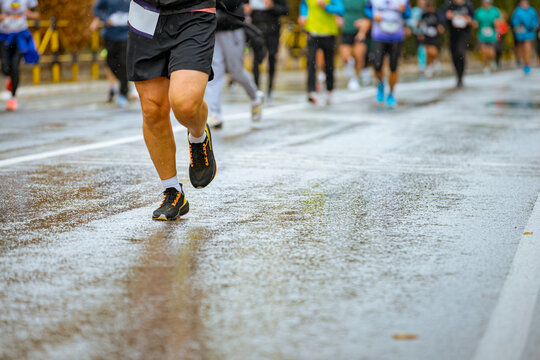 Large group of athletes running marathon