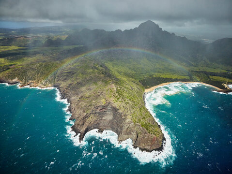 USA, Hawaii, Kauai, rainbow over Na Pali Coast, aerial view