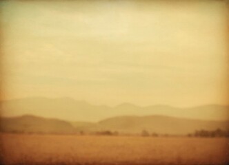 Fototapeta premium vintage countryside with gentle mists, pastoral landscape bathed in amber glow and soft haze
