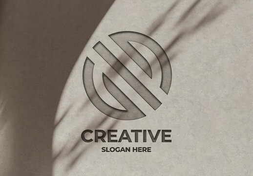 Debossed Logo Mockup on Concrete Wall with Shadows