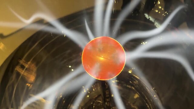 Plasma ball emitting electric light filaments