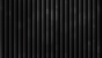 Obraz premium A close-up view of a black corrugated metal sheet with vertical ridges in a dark environment