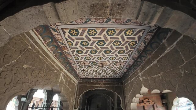 Ornate geometric patterns on the ceiling of the historic Rajwada Palace in Indore