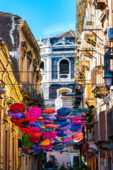 Colorful Umbrellas And Santa Chiara Church