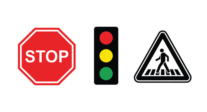 Traffic signs including stop light and pedestrian crossing silhouette