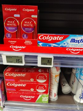 Saujon, France - January 24, 2026: Intermarche. Colgate toothpaste products displayed on a supermarket shelf, featuring Max White and Max Fresh varieties with visible pricing labels