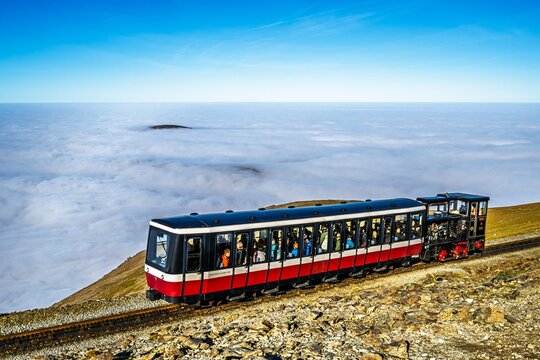 Train on Snowdon Massif, Snowdon Range, Snowdonia, North Wales, UK
