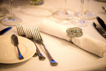 Elegant Table Setting With Cutlery And Decorative Napkin Ring