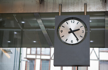 Modern Public Clock Display In Glass Interior Architectural Setting