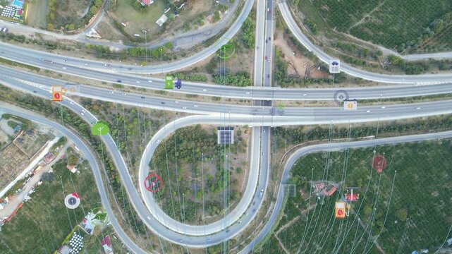 Overhead Cloverleaf Interchange With Icons, Closeup Of GPS Pins And Route Markers, Trucks And Delivery Paths