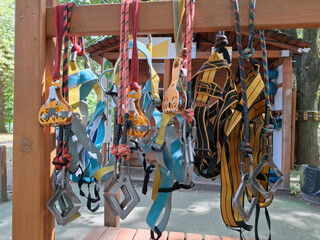 Safety belts for rope park. Using safety belts prevent accidents in rope parks