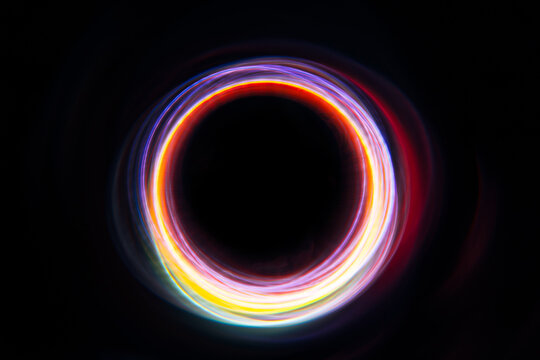 multicolored circular funnel on a black background