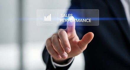 Obraz premium Businessman interacting with virtual sales performance graph.