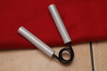 Hand gripper with metal handles for strength training