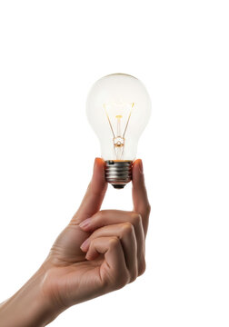 light tan female hand gently holding a glowing a19 incandescent bulb between thumb and forefinger, sharp macro focus, transparent high-key studio background, concept of innovation and ideas
