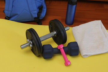 Workout equipment set with dumbbells and fitness accessories
