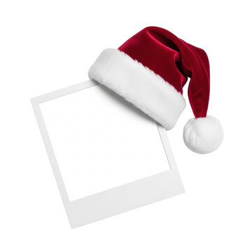 ultra-detailed crimson velvet santa hat with thick faux fur and pompom resting on a stark white instant photo frame, high-key studio lighting, shadowless background. Minimalist holiday cheer concept