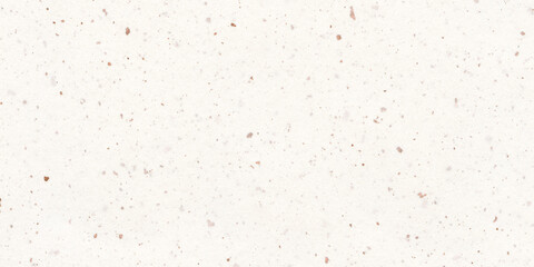 White speckled paper texture background with small random flecks, dots. Eggshell organic grunge pattern for natural design