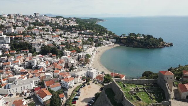 Aerial perspective of Small beach located on Adriatic coast in Ulcinj, Crna Gora. Drone video.