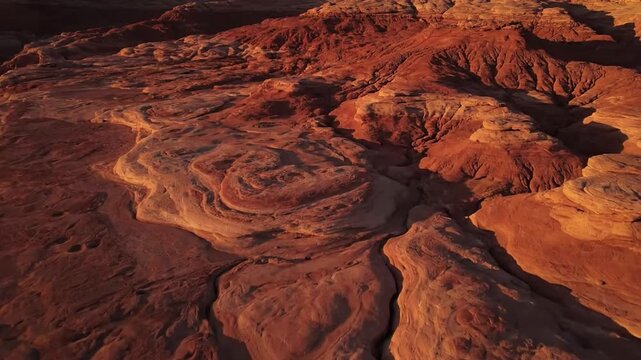 Subtle Color Variations in Weathered Rock Sweeping drone shot, highlighting natural pigmentation and shadows