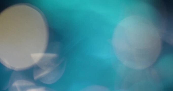 Abstract background with lens bokeh effect for title or logo display. Colourful light leaks on blurred background with copy space. Template for design.