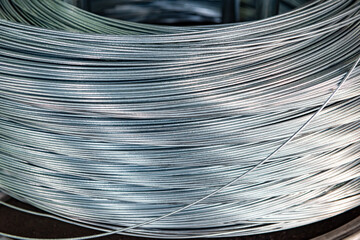 Close-up of Galvanized Iron Wire Raw Material Coils in the Machinery & Iron Factory Workshop