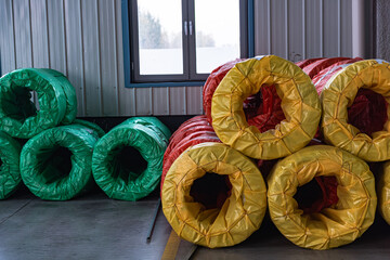 Close-up of Galvanized Iron Wire Raw Material Coils in the Machinery & Iron Factory Workshop