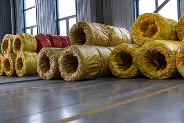 Close-up of Galvanized Iron Wire Raw Material Coils in the Machinery & Iron Factory Workshop