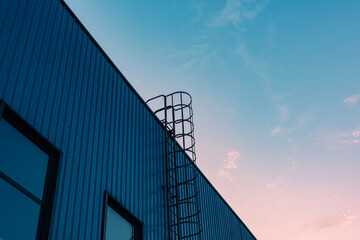 Beautiful exterior view of the Machinery & Iron Factory at sunset