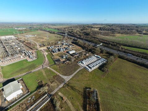 Aerial view of the National Grid Sundon Substation, the power lines stretch across the landscape, connecting the city to the energy grid, Luton, United Kingdom.