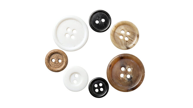 Assorted sewing buttons collection in various sizes, plastic and wooden fasteners for craft.